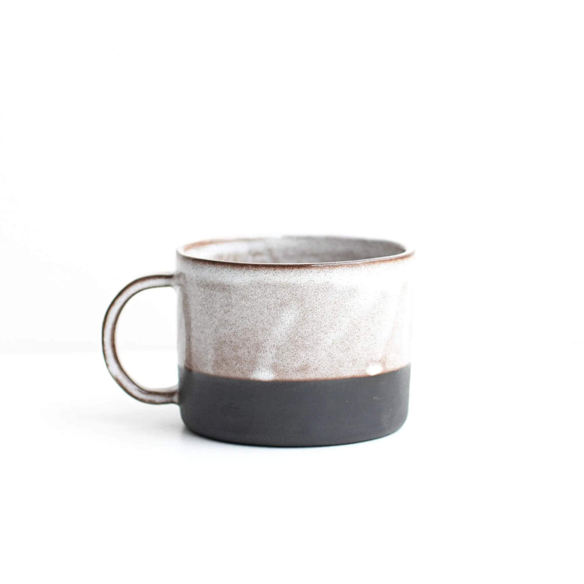 Medium Mug Snow (mottled cream) Black Stoneware Mug (Various Glazes) homeware shops bristol gift shops bristol Naked Clay Ceramics